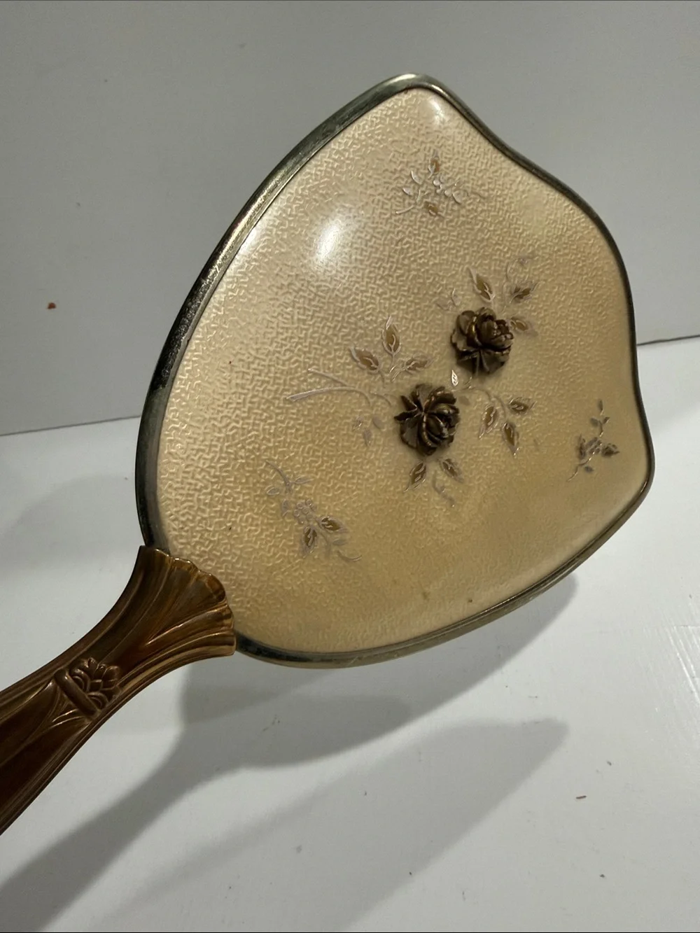 Mid Century Hollywood Regency Hand Held Mirror with Floral Detail 1950’s
